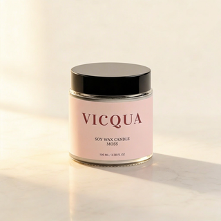 Vicqua soy wax candle with a pink label on a light background