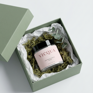 Vicqua skincare product in a decorative box with greenery on a light background
