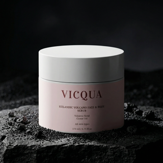 Vicqua Icelandic Volcano Face & Body Scrub jar with volcanic sand minerals on dark stone surface