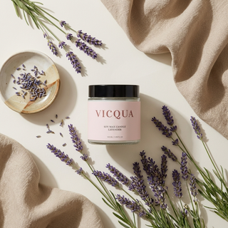 Vicqua lavender candle with lavender flowers on a light background