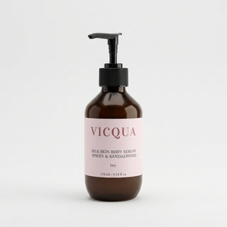 Vicqua Silk Skin Body Serum Spices & Sandalwood 270ml bottle on light gray background