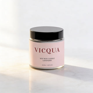 Vicqua soy wax candle with pink label on a white background